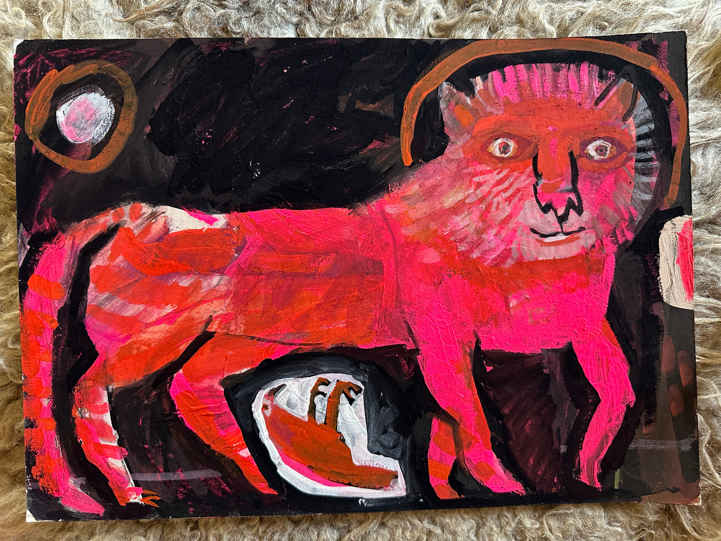 Kind lion with bird in amniotic sack
